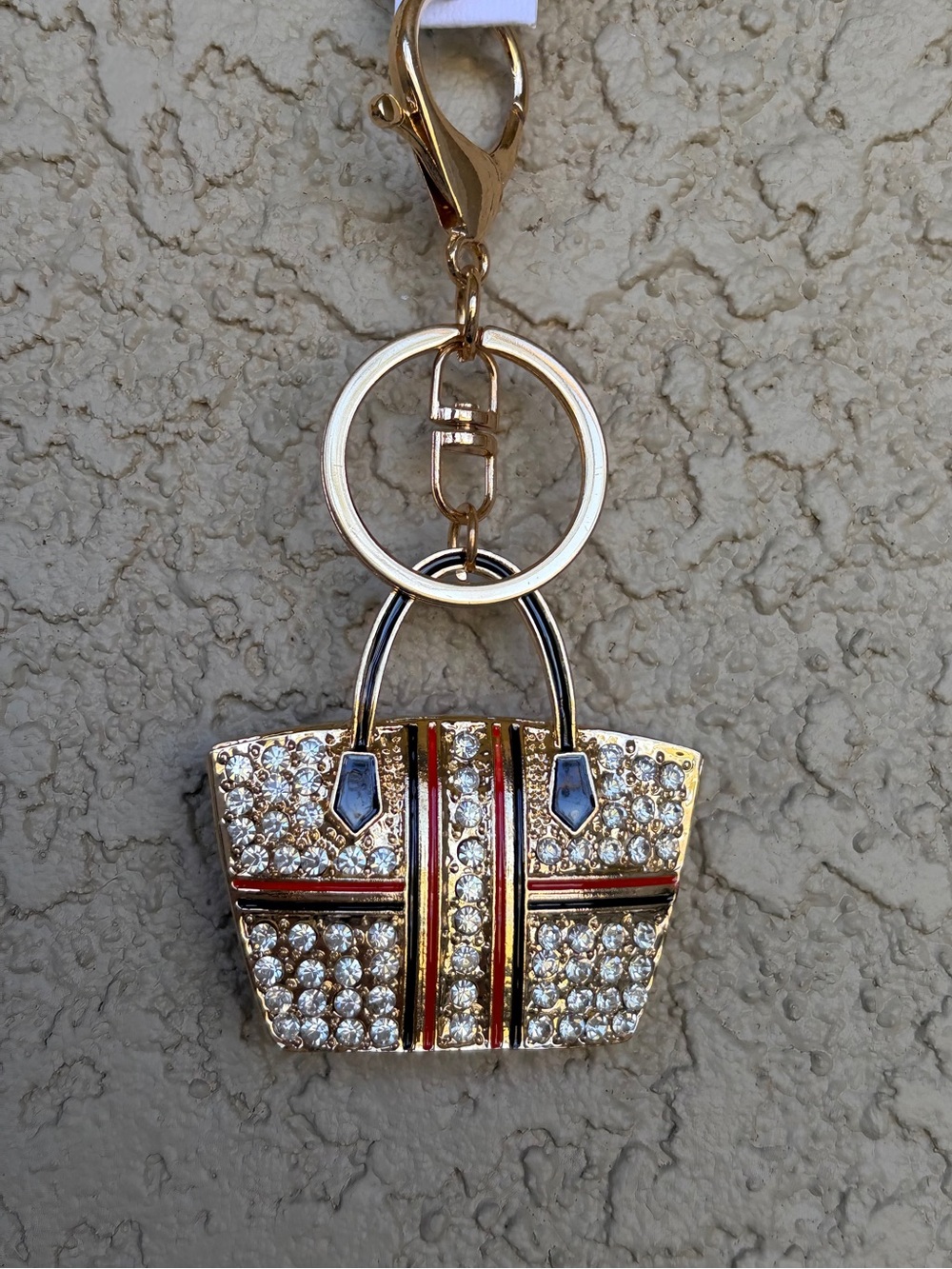 Sparkling Gold Crystal Tote Bag Keychain with Red & Black Stripes